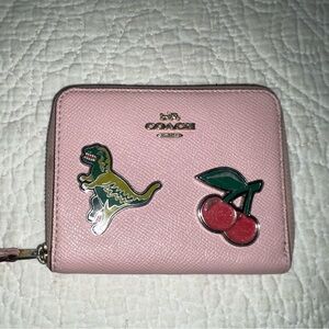 Coach pink corner zip Cherry & Dinosaur Metal Accent wallet